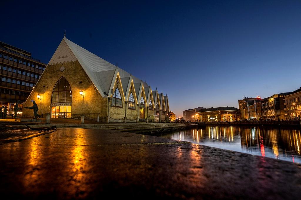 Vibrant night market scene with lanterns and local cuisine